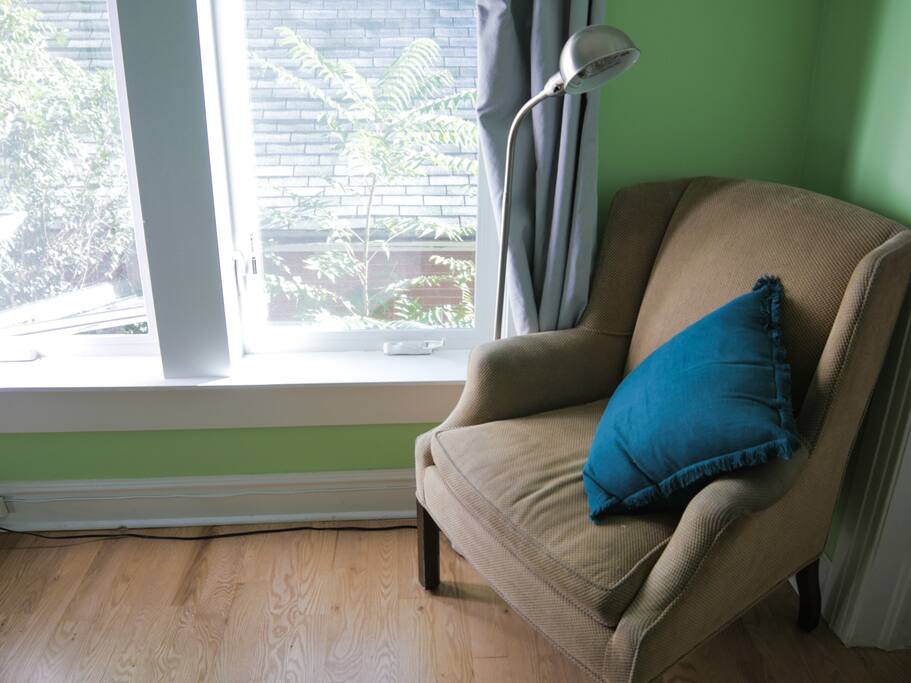 Reading nook with light and window.