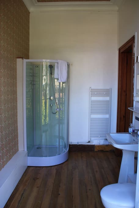 En-suite shower room with balcony.