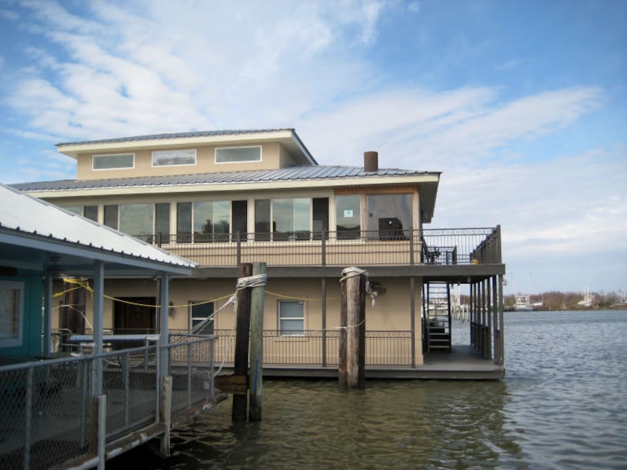 Large two story fishing camp
Upstairs patio deck with 2 tables seating for 10
