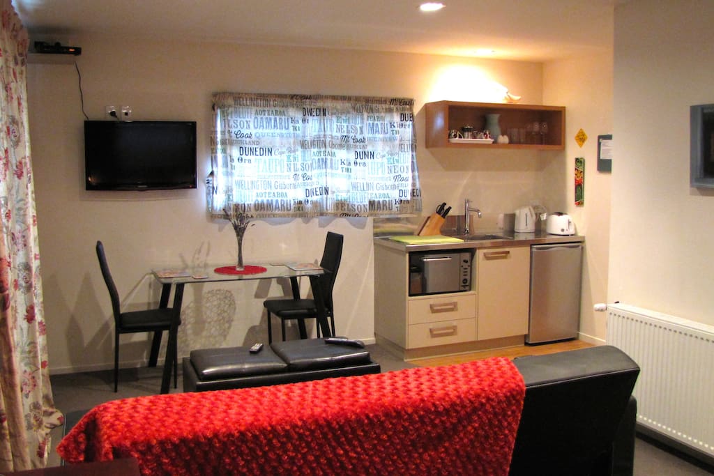 Living area - deck out to the left and entrance to the right.