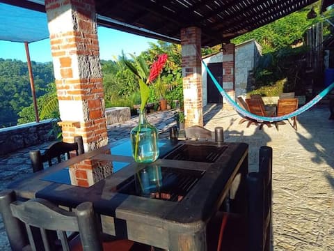 Sustainable Rustic House - Octimaxal House