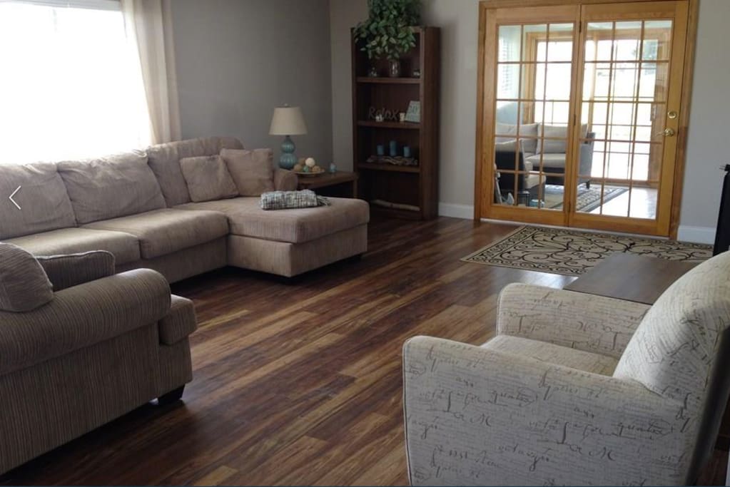 Open living room with plenty of natural sunlight.