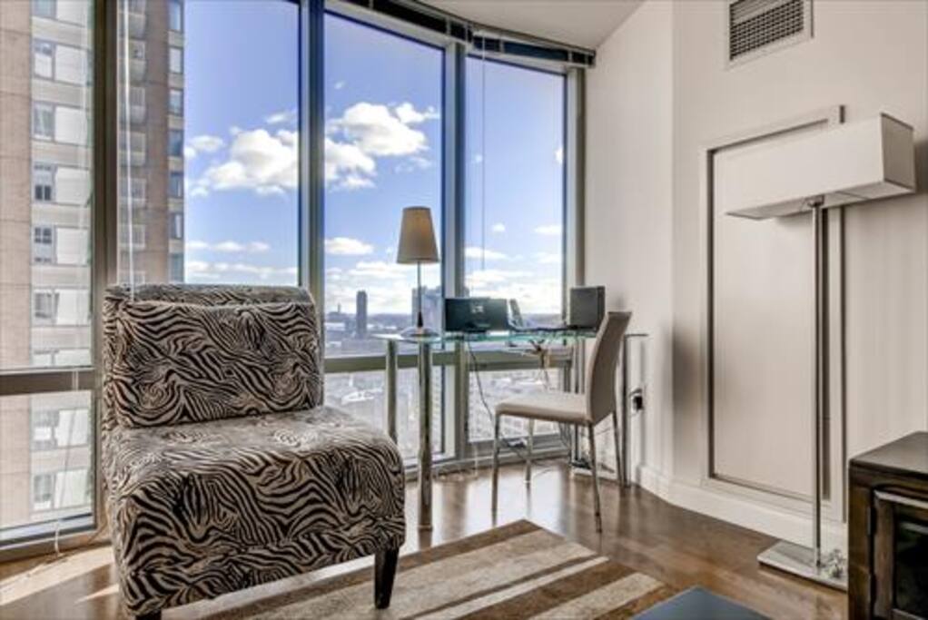 Convenient work desk overlooking city views