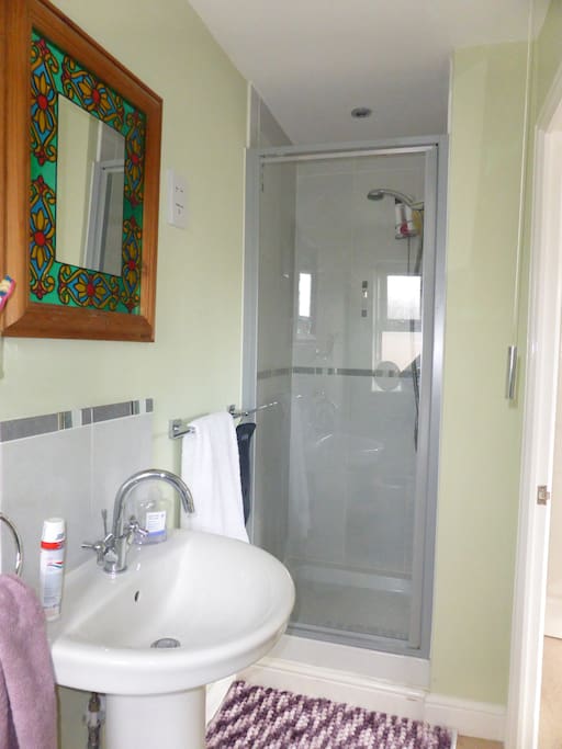 En suite to master bedroom with power shower
