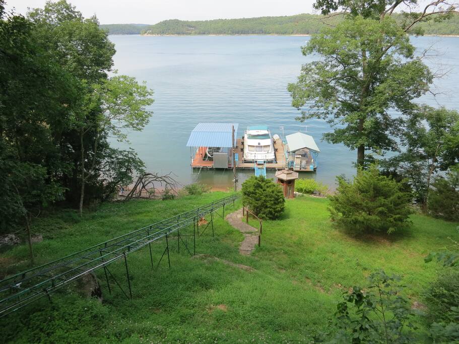 View from deck looking down to swim and boat dock