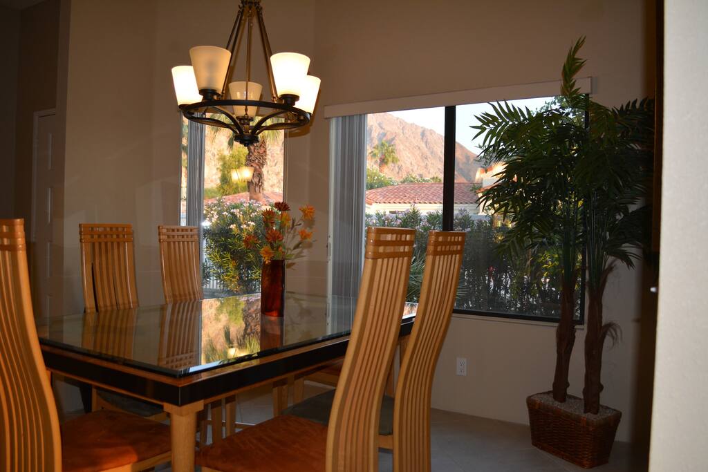Dining area seats 6 or 8 with extras on the end.