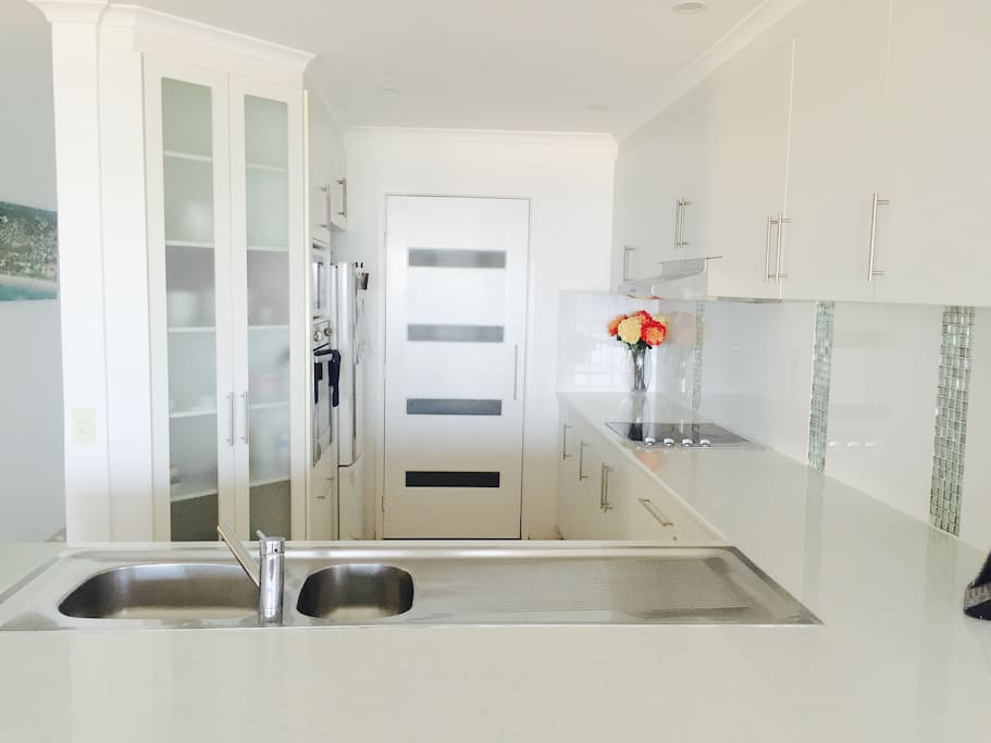 Modern kitchen with dishwasher. Very light and airy.
