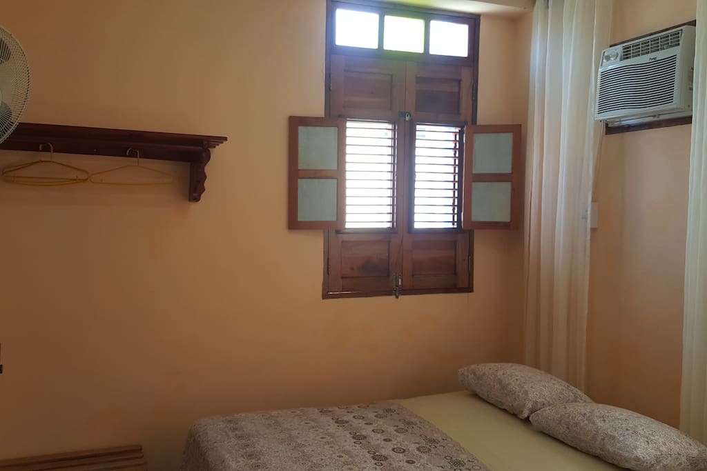 The cozy and spacius room has all the amenities you may need like big windows, air conditioner, fan, closet, clothes hangers and a comfortable and clean bathroom with hot water.