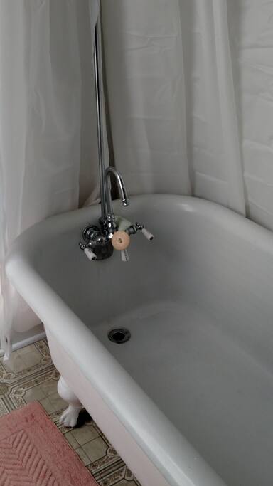 The claw foot tub is just down the hall. If a bubble bath is what you like we have Mr. Bubble and various soaking salts for your enjoyment.