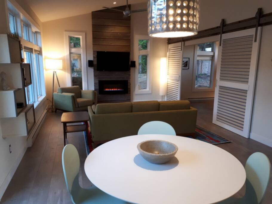 Just off the kitchen is the dining area perfect for dinner or an evening board game or cards. - Thinking I really should have taken the plastic off the lamp before I took this shot.