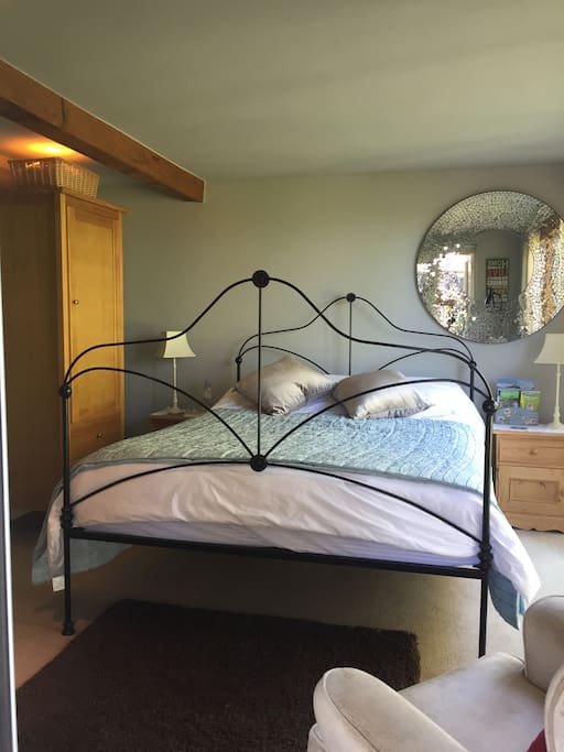 Bedroom 1 with patio area