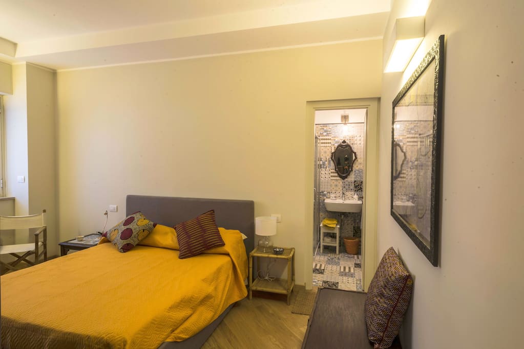 bedroom with bathroom door