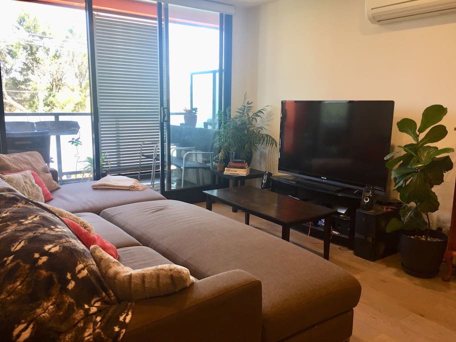 The supremely comfy couch perfectly places you in front of our extra large TV.