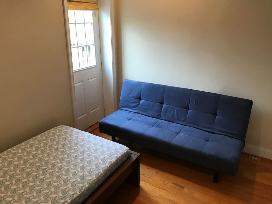 Twin sized bed and IKEA Sofa bed for additional persons.