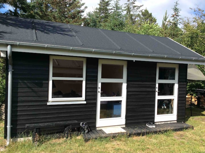 Annex by summerhouse, with shared bathroom.