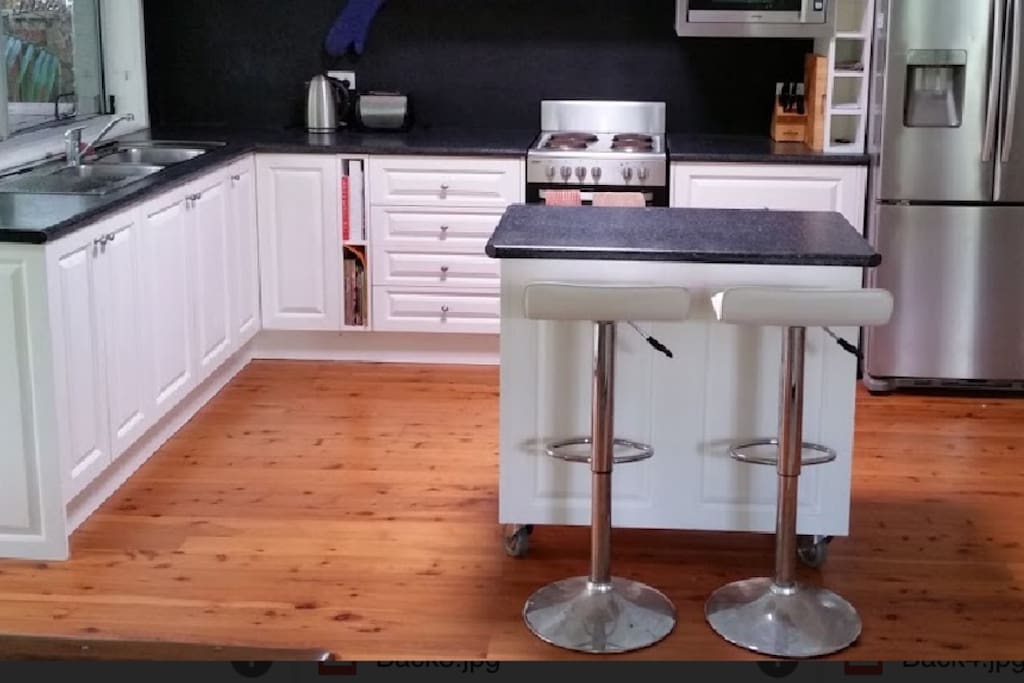 Gourmet kitchen with stunning timber flooring