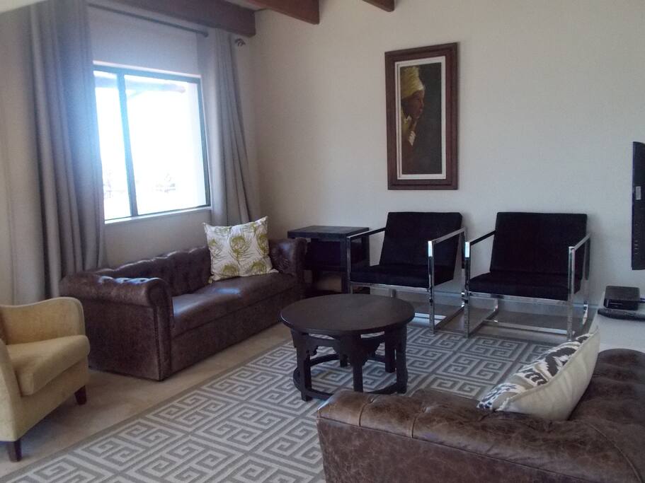 Lounge with flat screen tv/DSTV