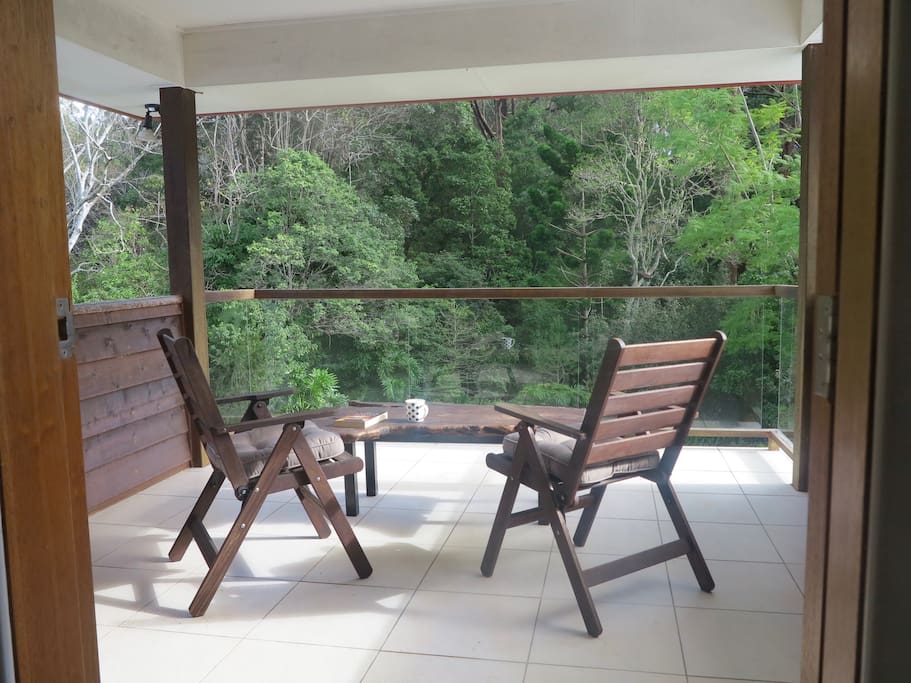 Soak up the rainforest bird sounds from your private deck.