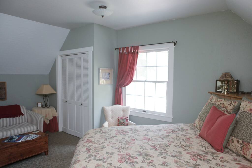 Karin's room upstairs with queen bed and private bath