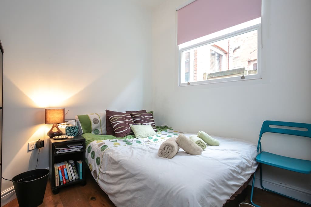 The Bedroom. The Bed is a clic-clac (no springs) sofa bed topped with a thick memory foam mattress. It's firm an comfortable. We have extra blankets and pillows in the wardrobe.