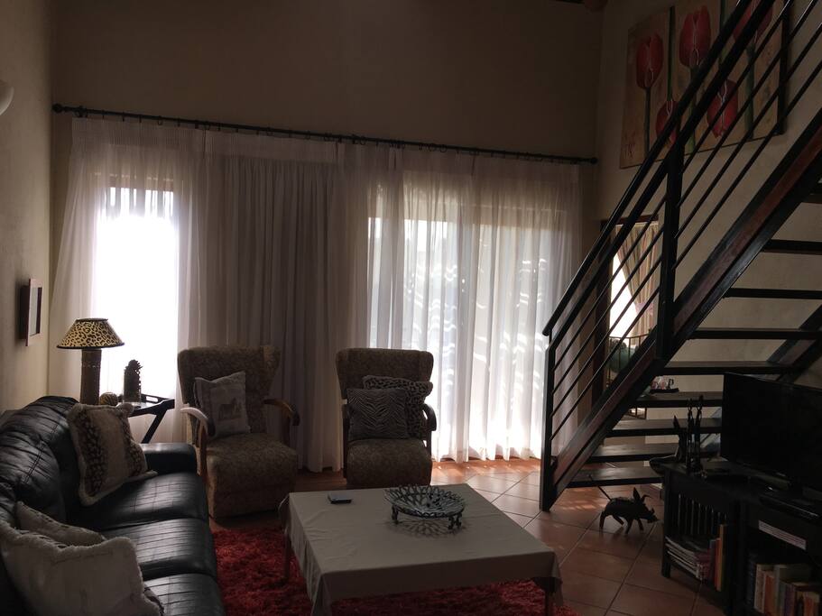 walking through the kitchen is the lounge ...