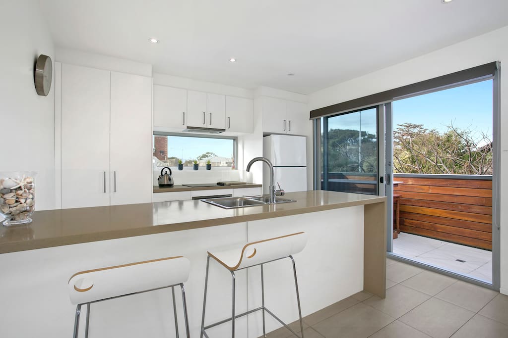 Well appointed kitchen includes quality appliances.