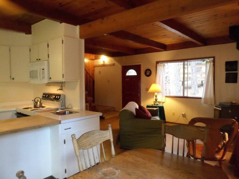 Kitchen table in kitchen plus outdoor table on deck