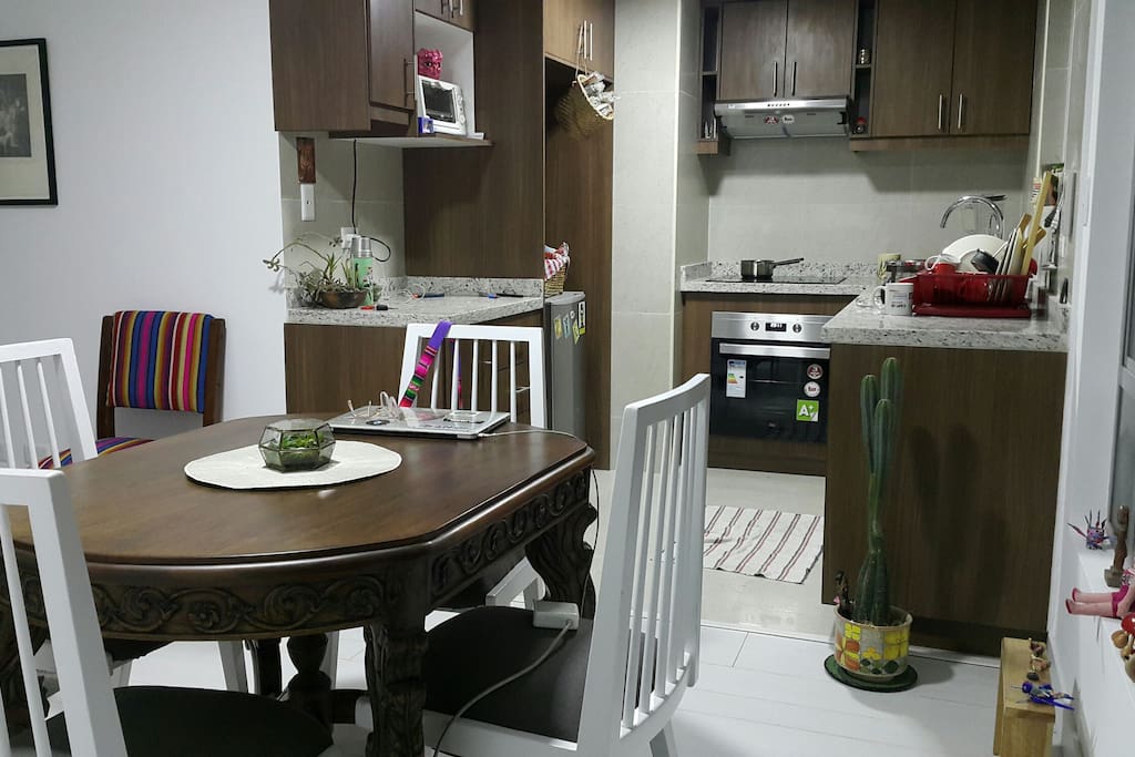 Dinner table and kitchen