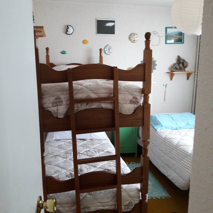 Camera con tre letti