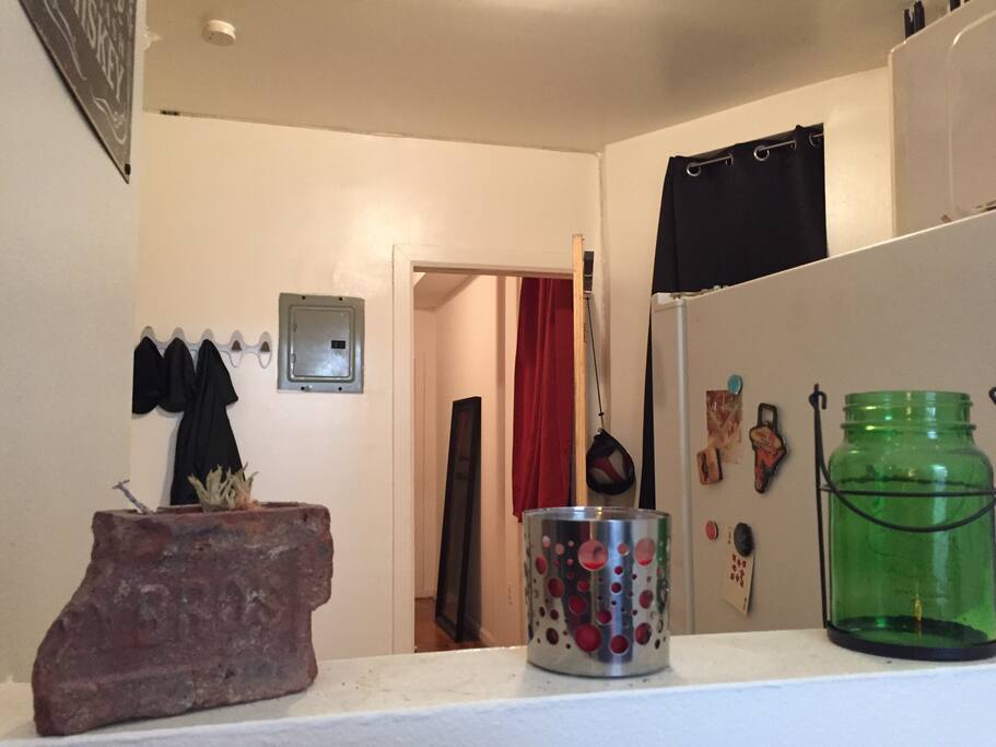 The kitchen space and the connection to the bedroom from the little window in the living room