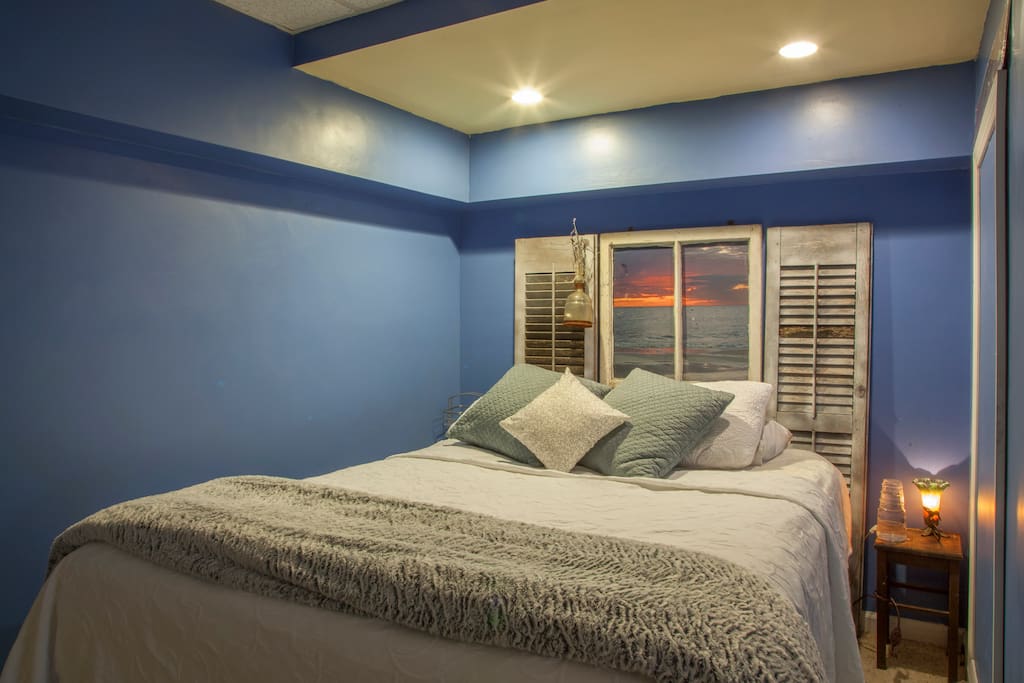 Comfy queen size bed with TV
