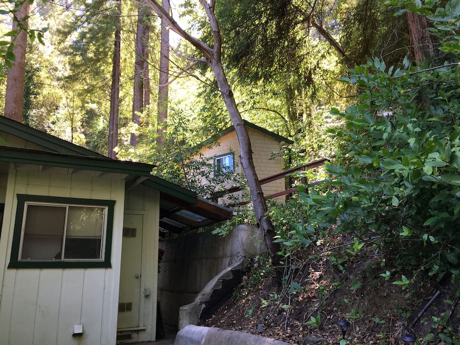 view of the main cabin with the upper cabin peaking out above it