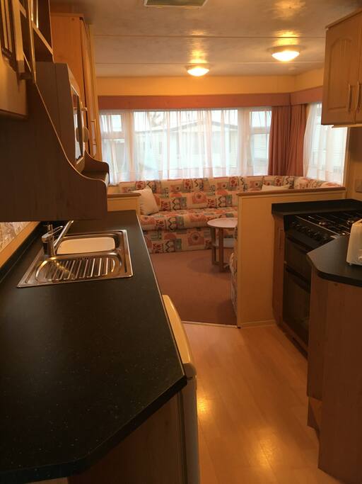 View through kitchen to lounge/ dining area