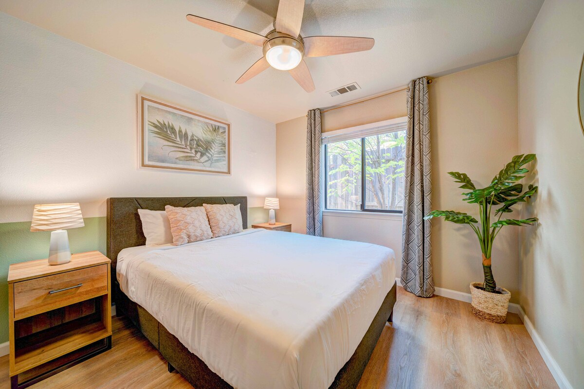 Bedroom 2: The zen green room. This cozy and inviting bedroom features plush bedding & a relaxing vibe. 