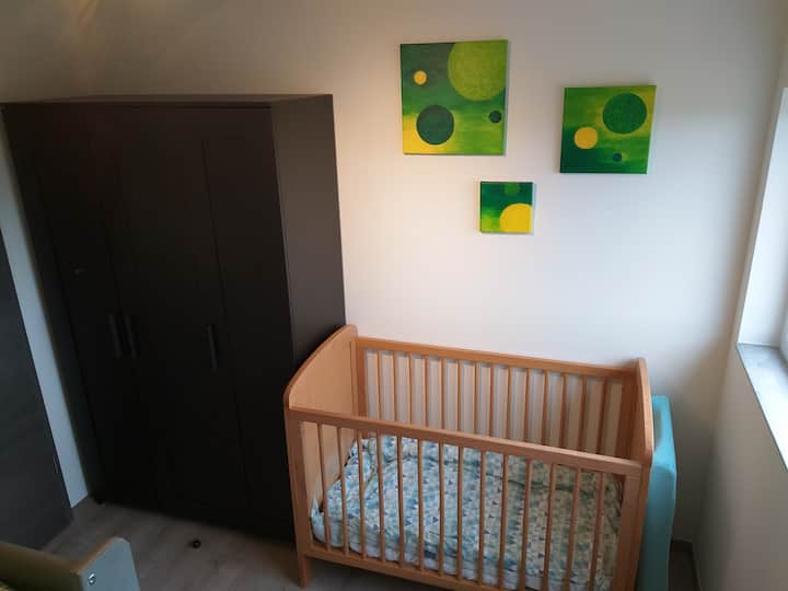 Bedroom with a crib 
