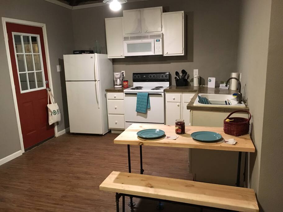 The kitchen comes with all the necessary utensils in case you want to cook.