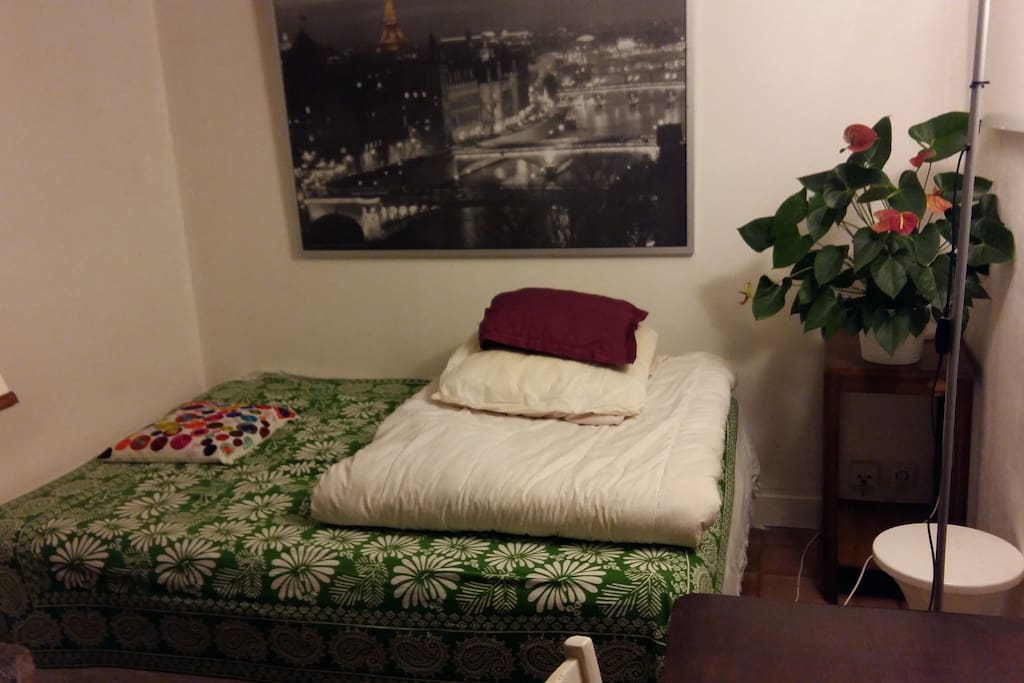 bed furnished with blankets and pillows