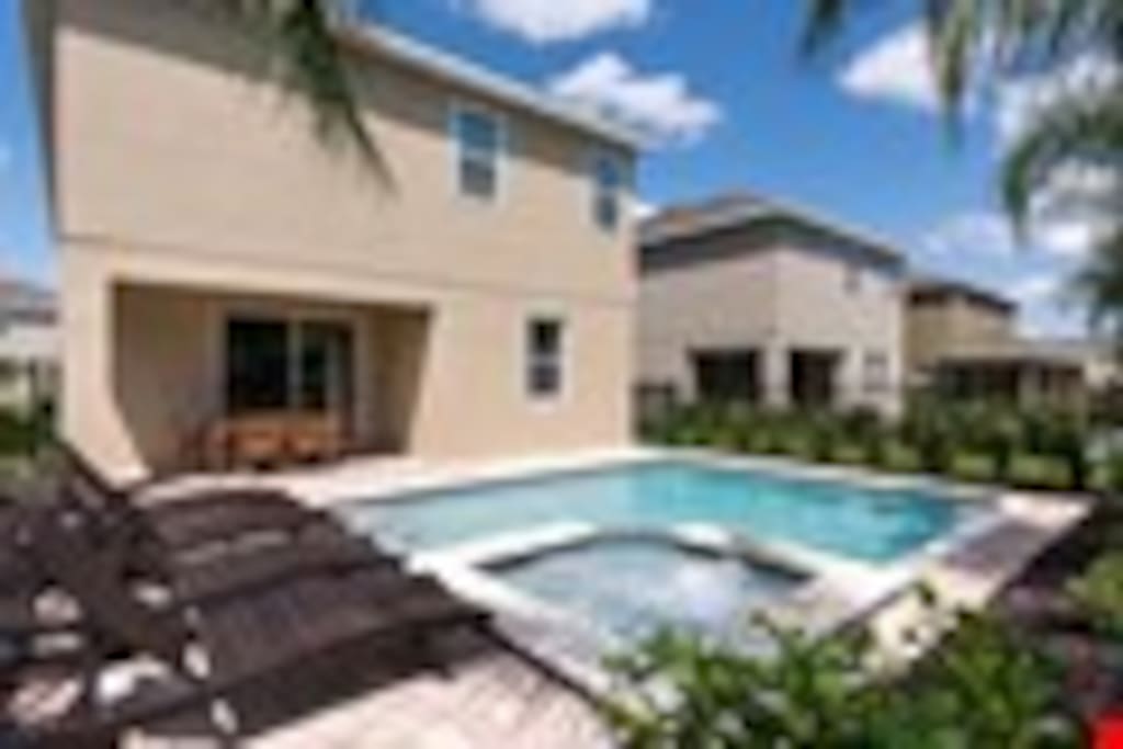 Float in the pool, gazing up at the blue Florida sky! Bliss! - Does heaven look something like this?! We think it might. Stretch out poolside or jump right in for a quick game of Marco Polo with the kids before cooking fresh seafood for an al fresco dinner.