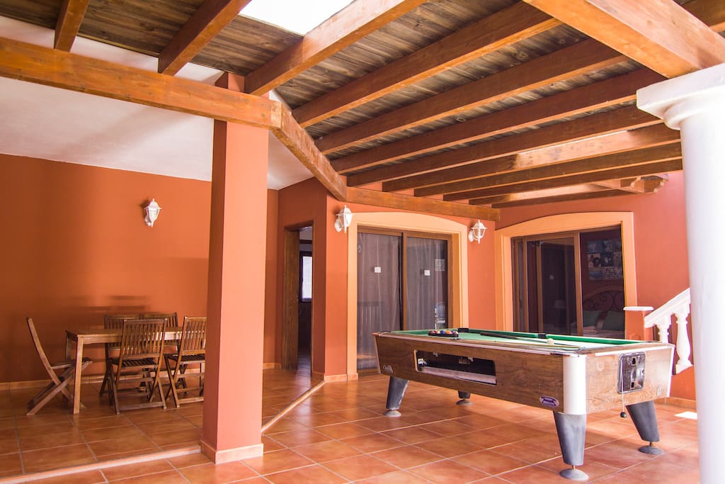 Big terrace with pergola,chairs,table and pool table