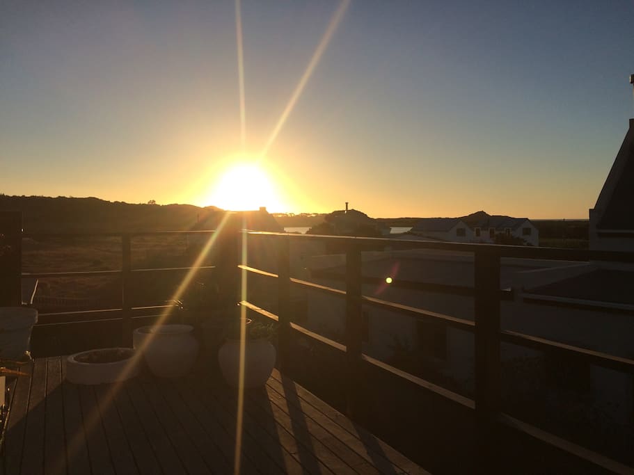 Sunrise or sunset from your balcony. Hear the Atlantic Ocean waves and see the birdlife of the little lake close by. Perfect for morning coffee of sundowners!
