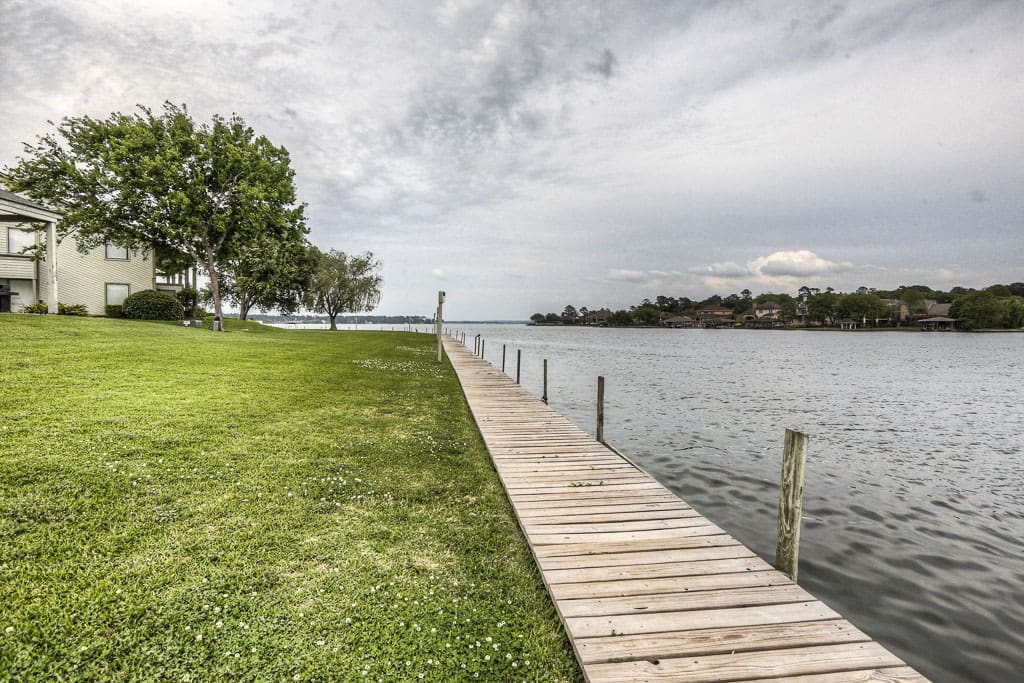 Boardwalk behind property along the water.