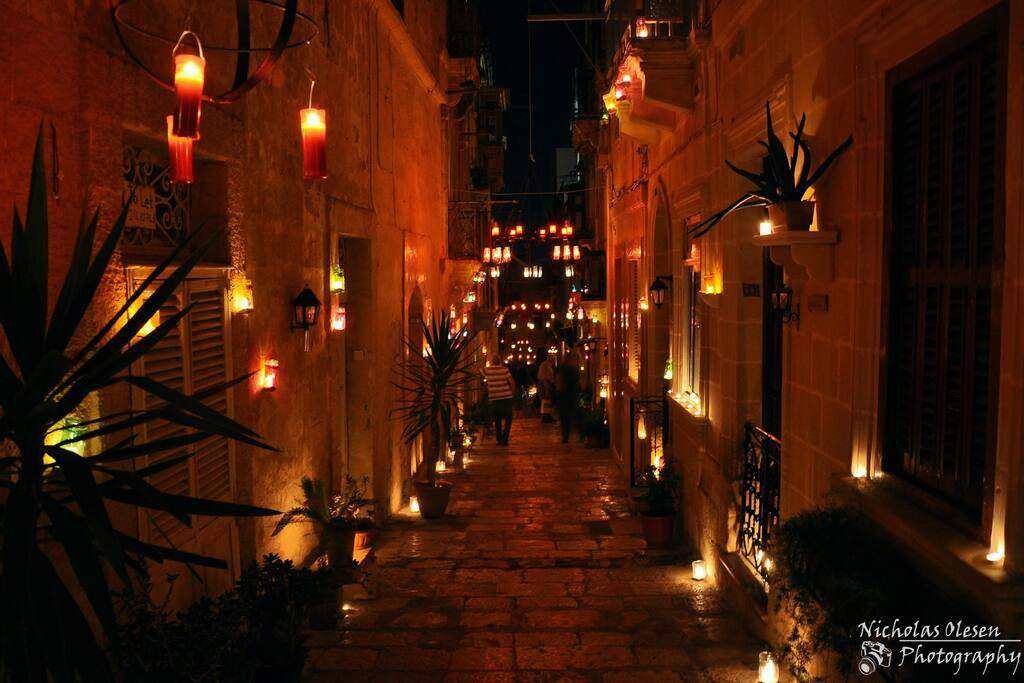 Birgufest, which is happening this coming weekend. Electricity will be switched off and Birgu will be lighten up by hundreds of candles. Traditional food, music and other entertainment.