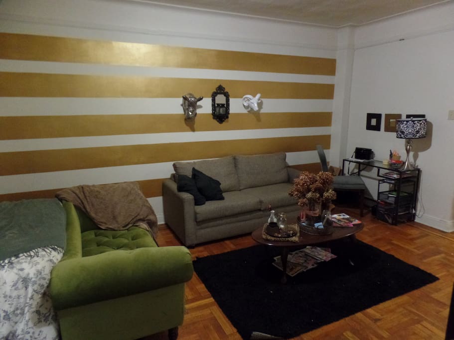 entertainment area with two couches and laptop working area!