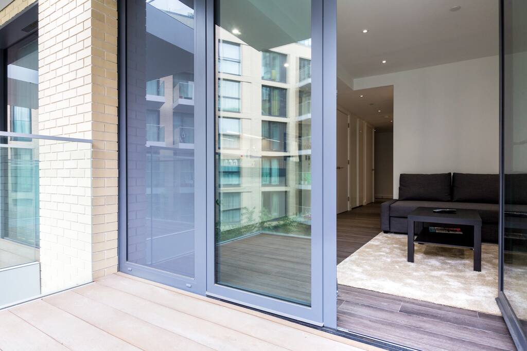 Glass doors open up onto my lovely balcony.