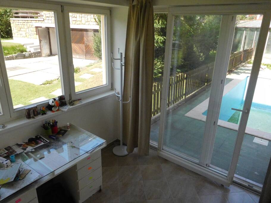 Winter garden with direct entrance to the swimming-pool
