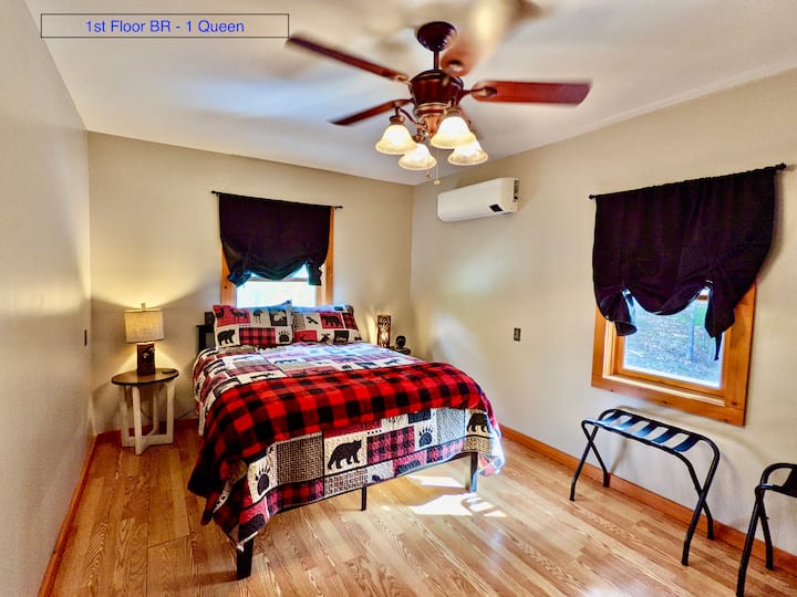 1st floor bedroom. Queen bed, desk, and built-in AC unit