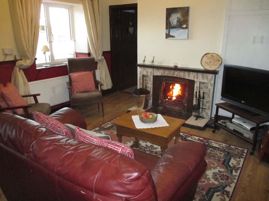 Living Room with open Fireplace