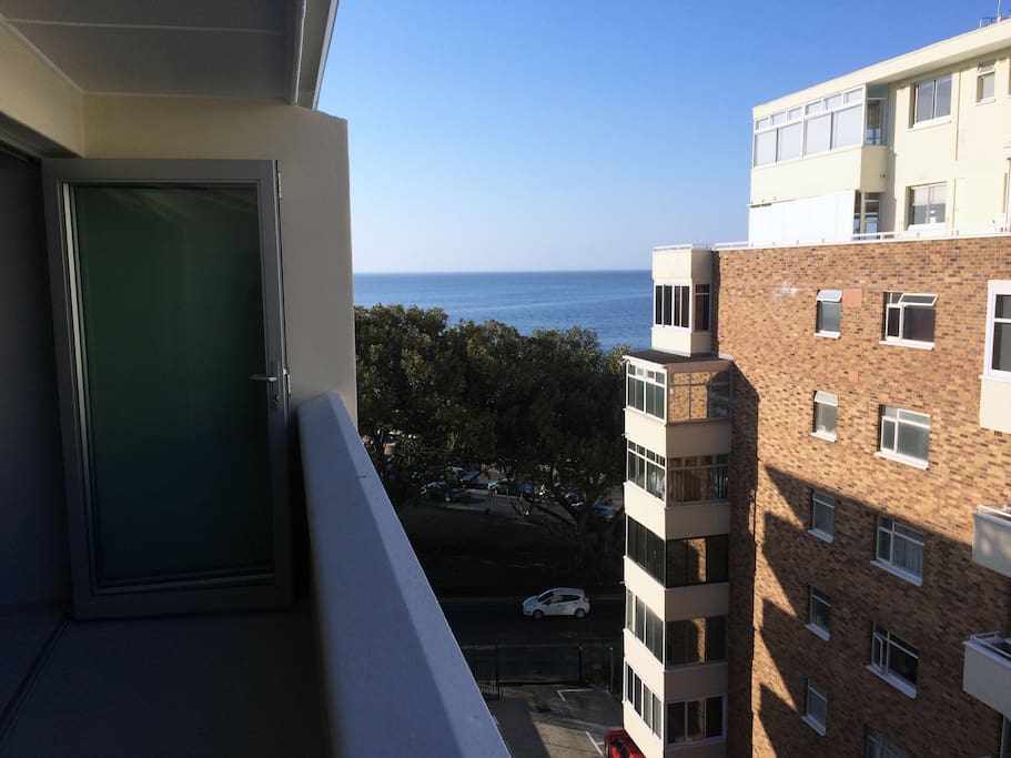 Balcony with Side Sea View; fully retractable doors.