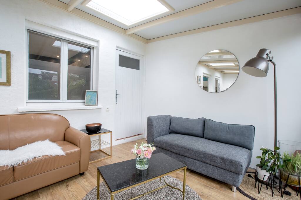 Sunroom/conservatory with second living area.
