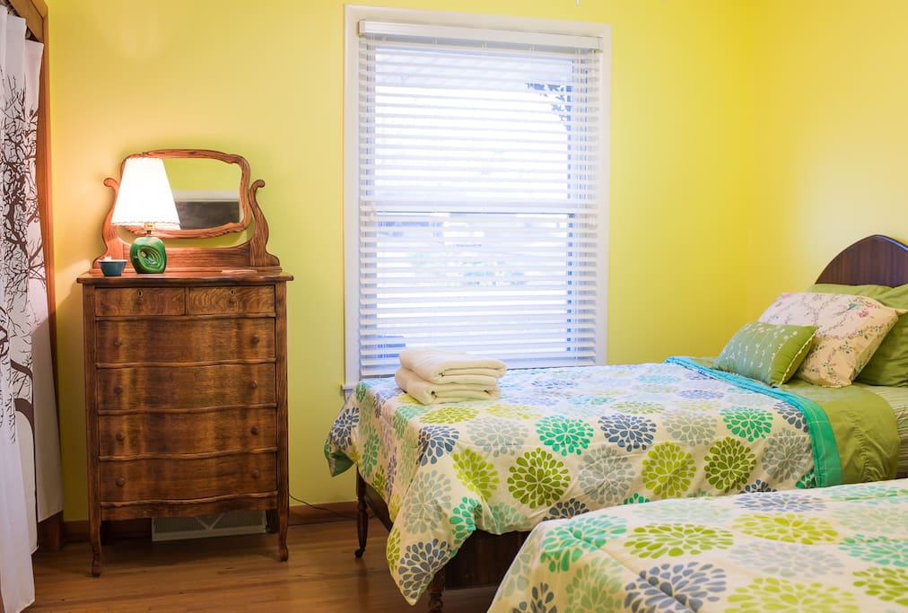 Bright room with large closet, hangers & hooks. Two comfy twin beds.